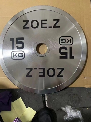 Krachttraining barbell met gewicht platen set en zilveren chroom plaat barbell set