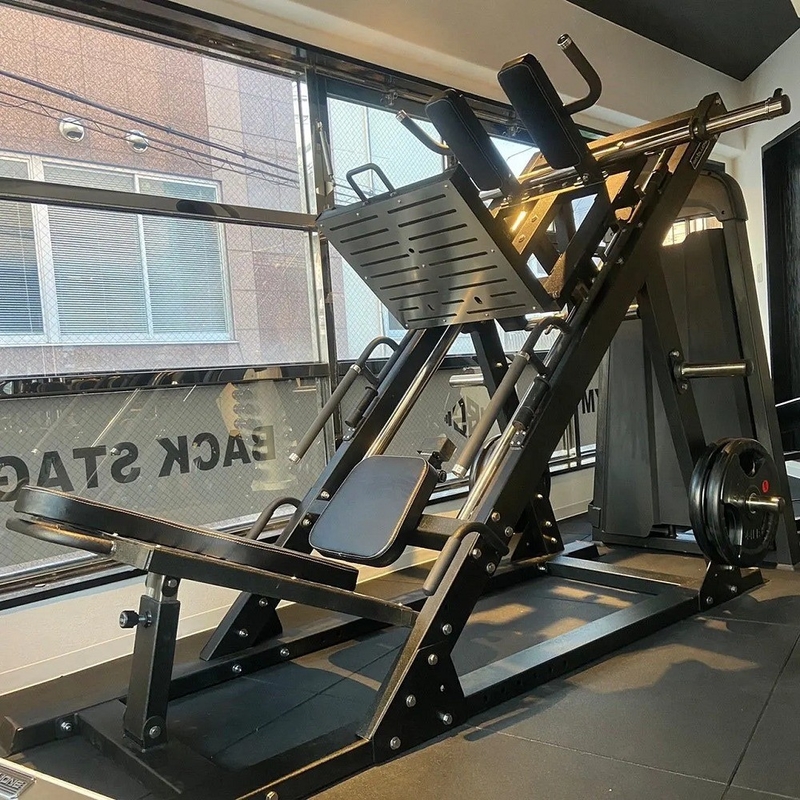Duurzame universele 2 in 1 Dual Function Plate geladen Leg Press Hack Squat Gym Equipment